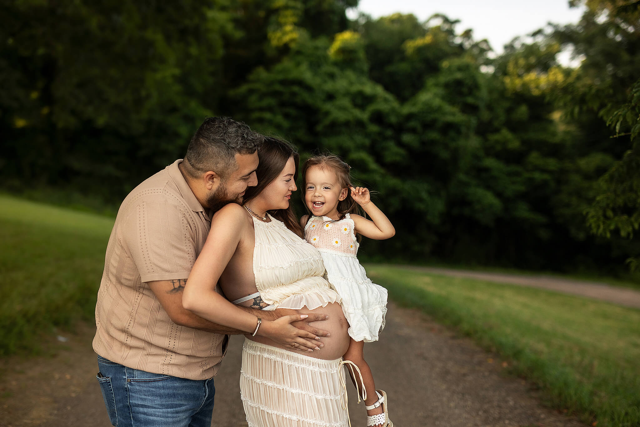 Pregnant mom and dad holding toddler-maternity photo session Mansfield Ohio